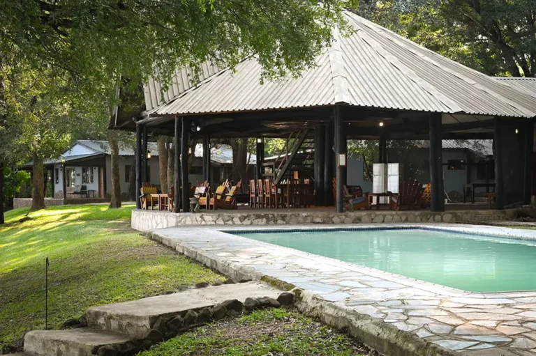 View of Wildtracks Lodge with pool